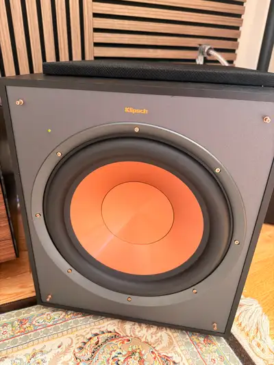 Enhance your home theatre experience with this powerful Klipsch subwoofer, delivering deep, immersiv...