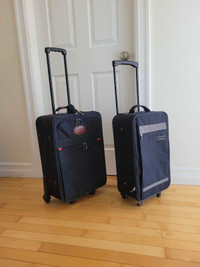 2 NEW Carry-On Suitcases. 21 Inches Tall. Price for Both. 