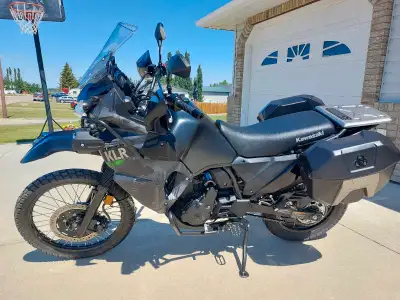2022 KLR650, 5400km, like new and runs perfect. Never dropped. Upgraded footpegs, mirrors, barkbuste...