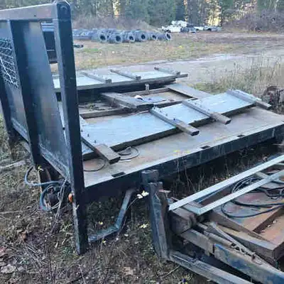 Good shape older well built truck flat deck with tilt and wood sides. Electric over Hydrolic Pump wo...