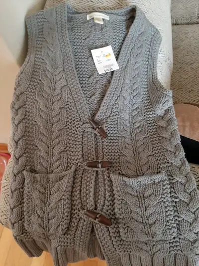 Brand new youth size small vest, View more