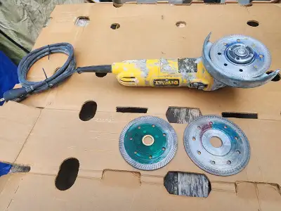 For sale a used DEWALT 7 amp 4 1/2-inch Small Angle Grinder With One-Touch Guard. Model # DWE4011 St...