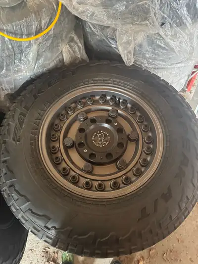 Get ready to upgrade your ride with this used Black Rhino Rim! This rim features a 285/70R17 tire, r...