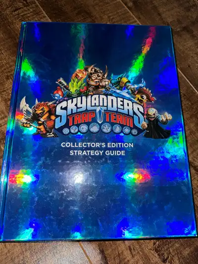 Great condition hardcover Skylanders trap team collectors edition strategy guide. Tiny tear on index...