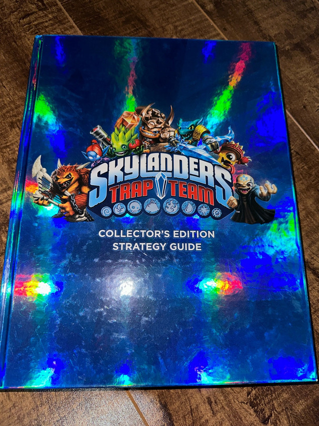 Skylanders trap team collectors edition strategy guide hardcover in Children & Young Adult in Hamilton