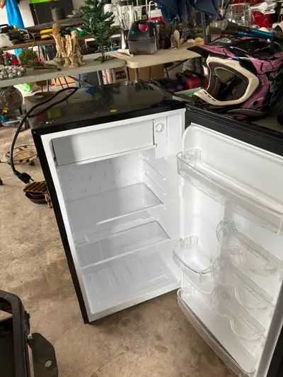 Mini Fridge works great 50.00 firm