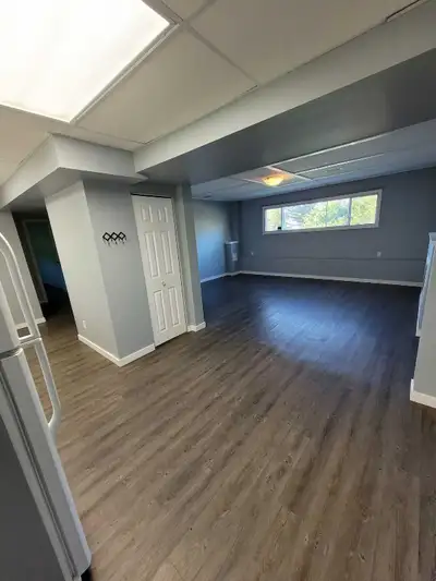 Bright, clean, walk-out 1 bed 1 bath basement suite. In-suite laundry, parking, separate entrance, $...