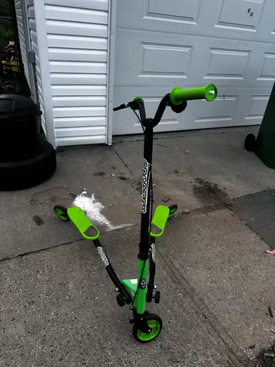 Always kept in the garage. In great condition, push from side to side to move forward and brake with...