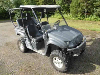 2006 Yanaha Rhino 660 w/rear roll cage and rear bench, runs and works well but the one way starter b...