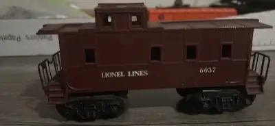 I have one Lionel 027 gauge caboose from a 1953 set has minor rust spots on metal parts other than t...