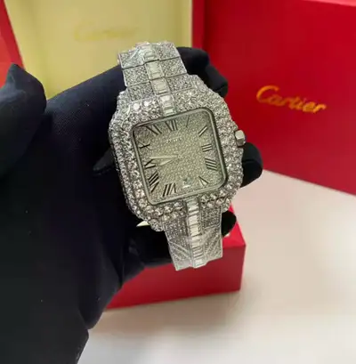 Moissanite watch comes with box,papers and certificates for the stones. Very high quality. passes di...