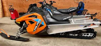 One owner 144” track Reverse Heated handle bars Speed limiting currently is bypassed. Wired for heat...