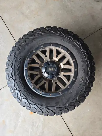 Brushed Brass Rims by Fast, with BFGoodrich All Terrain T/A K02 17". Only 14,700 kms. Excellent Cond...