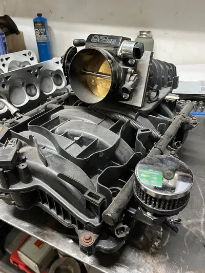 Early year Gen 3 Hemi truck intake, with a set of like new Deatschwerks 42lb injectors and a LS 92mm...