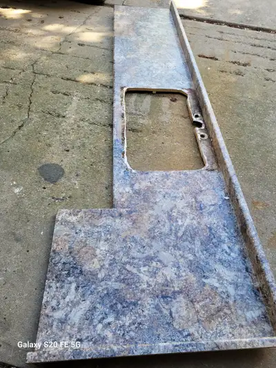 Only had it for 7 yrs 128 x 24 , back splash is 3 in The longer part at the end is 34 3/4 The extra...