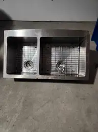 Double stainless steel apron sink. 