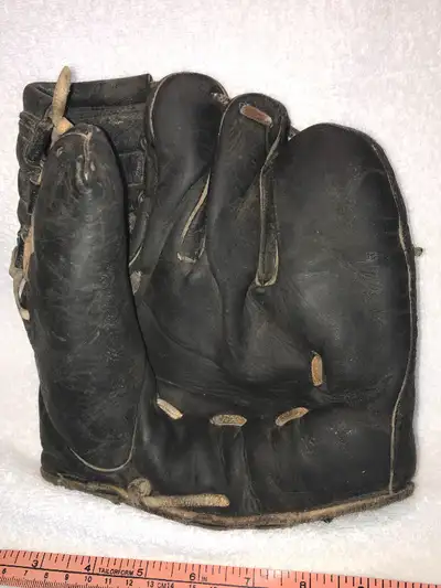 In good used condition a Vintage Cooper Weeks Limited Black Leather Baseball Glove, 1940’s to 1950’s...