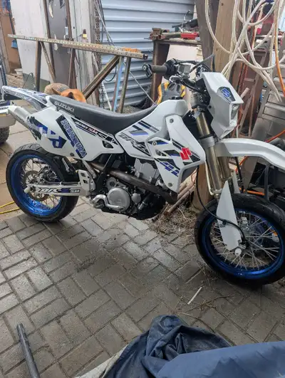 2017 Drz400sm low kms and ready to ride. May need tires for safety but could probs pass. Fresh oil a...