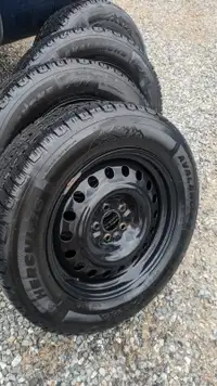 Winter Tires with Rims - 245/60R18. Used 2 seasons, like new.