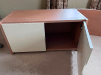 Light brown wood tv stand with shelves