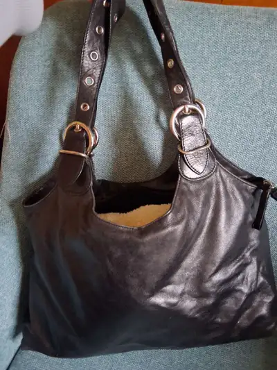 Danier genuine leather bag, View more