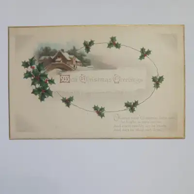 Celebrate the holiday season with a touch of vintage charm on this Antique Christmas Greetings Postc...