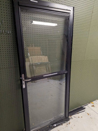 Glass door with retractable screen