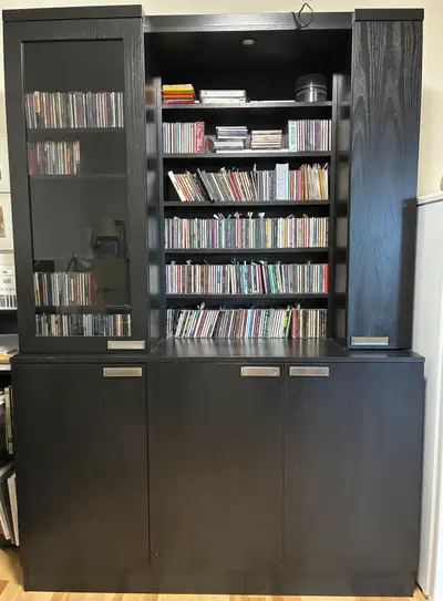 Custom designed and built by a craftsperson. All you need in one place. A beautiful solid oak music...