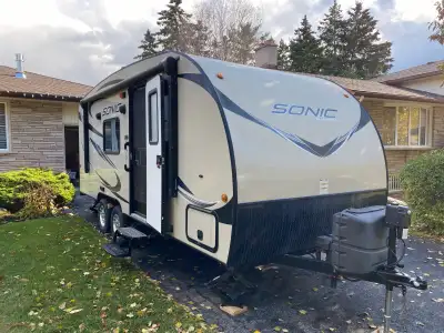 Very low use trailer, stored indoors every winter. Excellent condition, murphy bed, solar panel and...