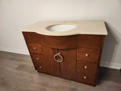 42" solid wood vanity cabinet with granite countertop. Condition - very good, no stains /cracks. Mat...