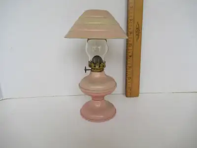 Vintage unused Plume and Atwood miniature tin oil lamp. Approximately 7 3/4" high. No wick. No chimn...