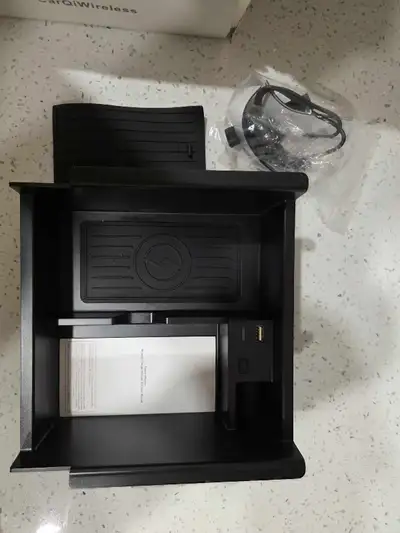 Brand new, never used. Comes in box with cable. Wireless charging tray designed specifically for Toy...