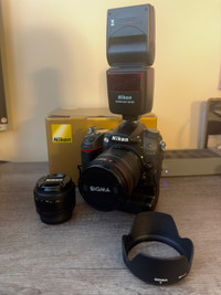 Nikon D7000 with many extras (18k actuations)