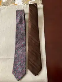 2 ties- the paisley tie is 100% silk, the 2nd is polyester 