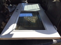 Entry metal door with glass insert-36"W x 791/4”H-  $250