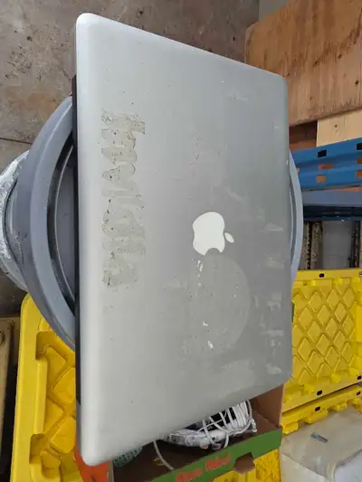 MacBook PRO and charger as is. Does not turn on. Charger works. Lights turn green when plugged into...