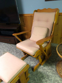 Glider chairs with glider ottoman. 