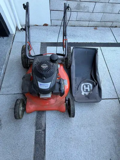 Husqvarna 7021P has lawn mower. 21inch, 160 cc Honda engine. Used for 3 seasons. Has been in the gar...