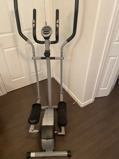 This Sunny Health&Fitness “Elliptical Cross Training Machine “ got it all, tension control and LCD i...