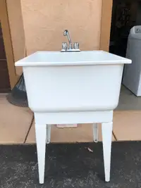 Laundry sink with taps