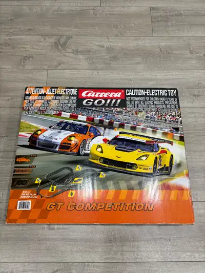 Get ready to race with this Carrera GO!!! GT Competition electric slot car racing set! This set incl...