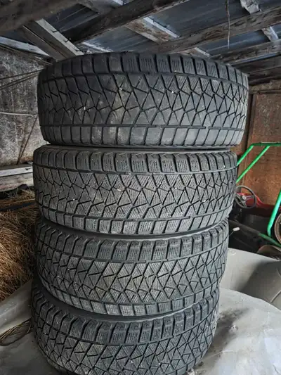 Like New Blizatz Winter Tires 17" 225/60R17 99S. A little wear and tear but nothing serious. Overall...