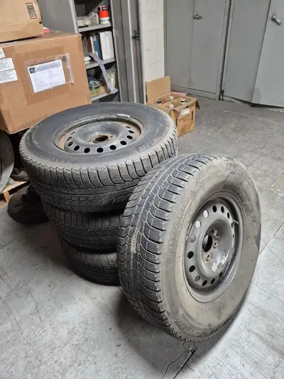 Set of 4 Michelin tires and rims 235/70R16, The tires are used but steel rims in good shape Bolt Pat...