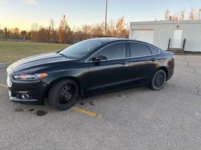 * Features: AWD, Sunroof, remote start, heated seats, 2 sets of tires on their own rims, Ford alloy...