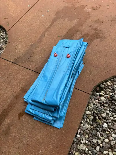 25x50 pool tarp, 24x40 leaf net (some minor tears) and 10’ water bads (10 of them)
