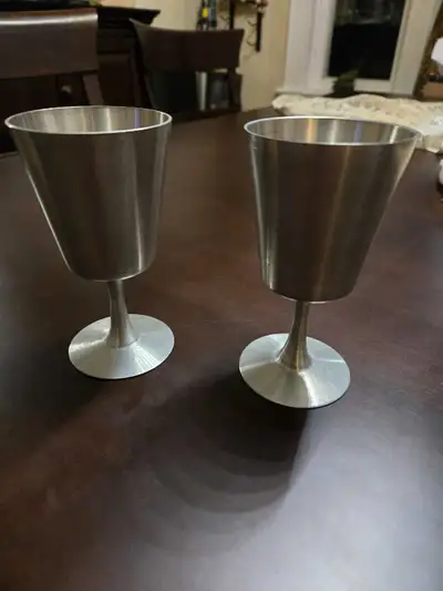 These hand-made pewter goblets by Jon Crumbell are a unique addition to any collection. They are in...