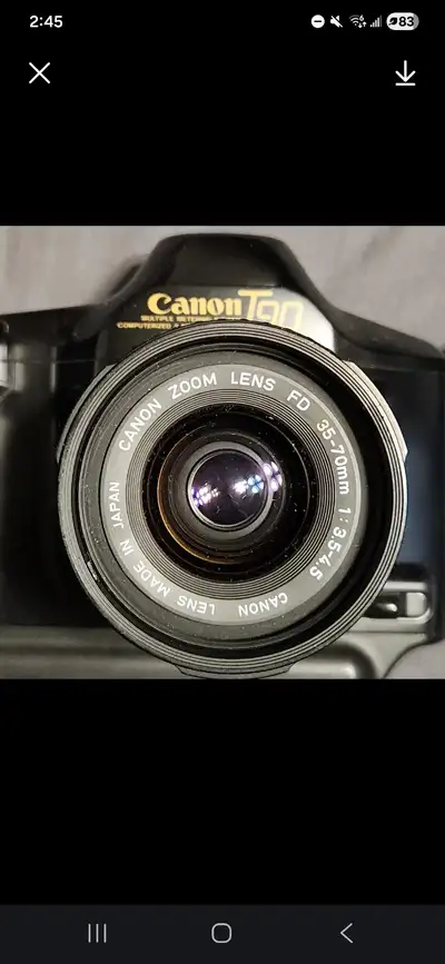 Canon T 90 with Canon Zoom Lens FD 70-210mm and Flash, View more