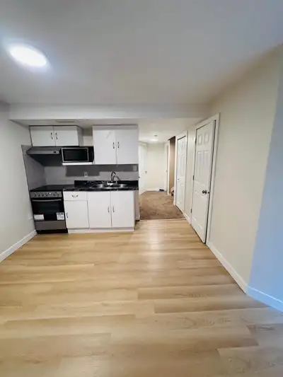 2-bedroom basement with 1 bathroom (shower); storage room. Spacious kitchen includes a fridge, stove...