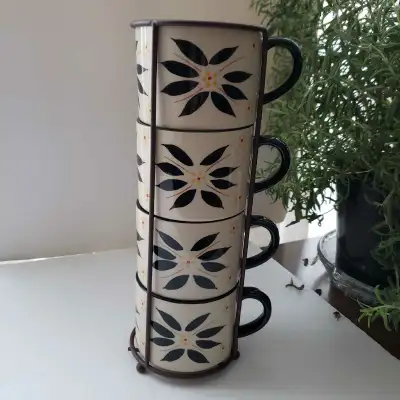 This set of Temptations mugs comes complete with a convenient storage rack, perfect for keeping your...
