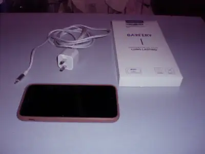 Have an unlocked iphone 7 and accessories for sale as a bundle See pic for all items- phone, case, n...